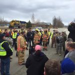 Responders at the scene of the staged collision at the fairgrounds