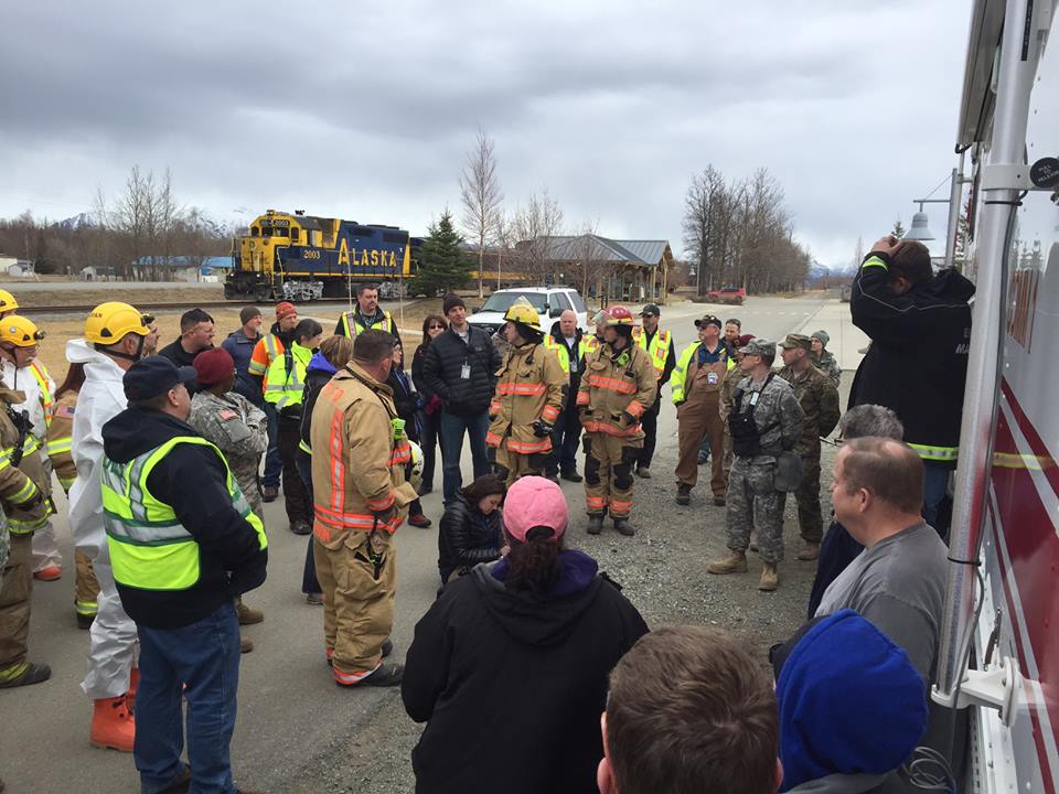 Responders at the scene of the staged collision at the fairgrounds